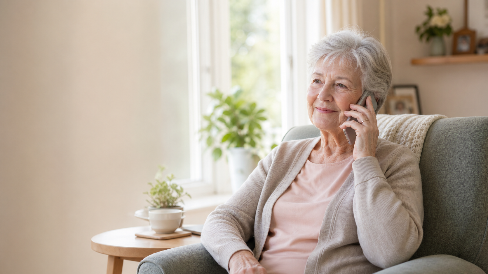 A senior receiving an encouraging phone call at home